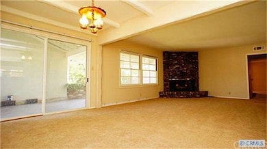Another view of the living room with the sliders o