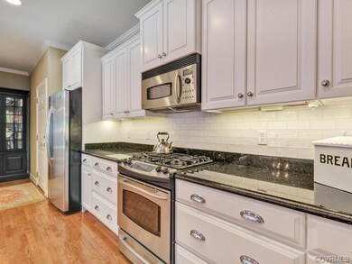 Plenty of storage and cabinets! Ceramic tile backs