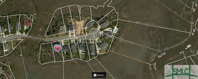 Aerial View of Sapphire Island Rd. The red marker 