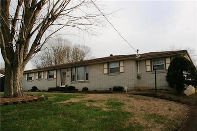 This all Brick Home offers a Concrete Driveway and Full Front Sidewalk.