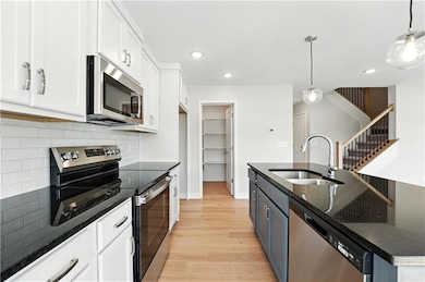 709 SW Glenn Cir, Raymore, MO 64083 - photo 2