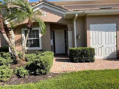 Property entrance featuring stucco siding