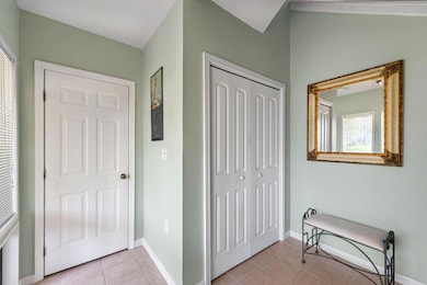 foyer and door to garage