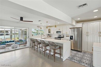 Gorgeous waterfall granite counters and coffee bar