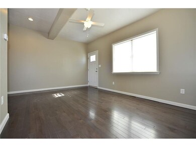 Living Room. The light & bright living area has pl