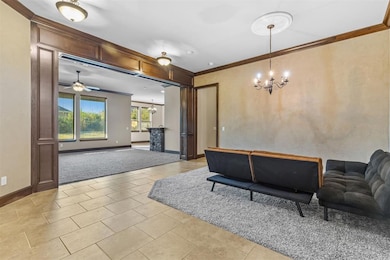 Common area with crown molding