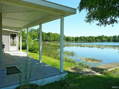 Garage, fishing shed and parking area.