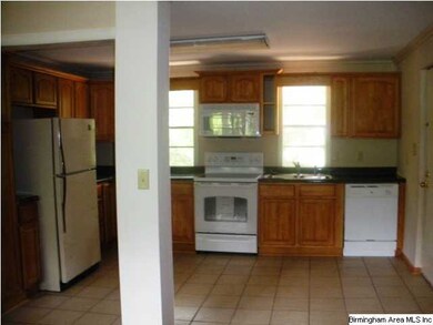 View of kitchen from dining/living area.
