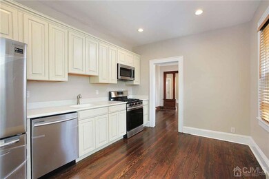 Updated Kitchen - quartz counters, stainless steel appliances.