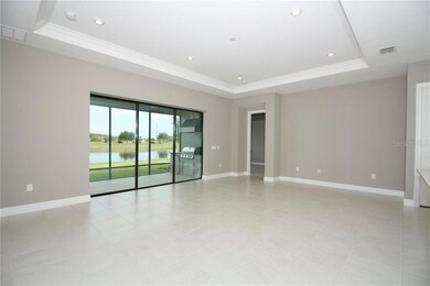 The large sliding glass doors at the Gathering area brings the outdoors in with views of your backyard oasis!