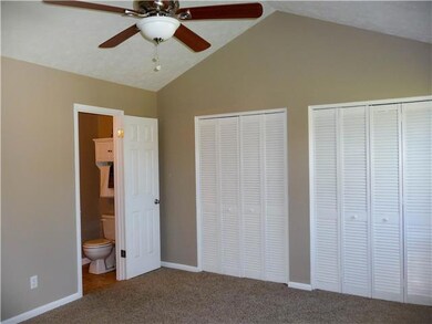 Master Bedroom has Soaring Ceiling with Ceiling Fan, Double Closets and  Half Bath