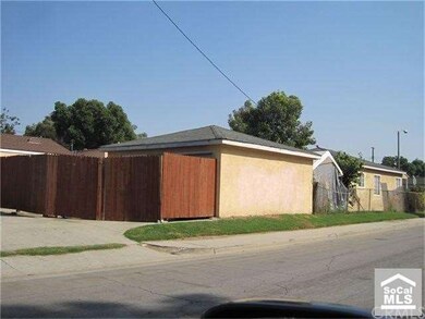 Spacious garage with vehicle access from the alley