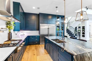 Kitchen featuring appliances with stainless steel 