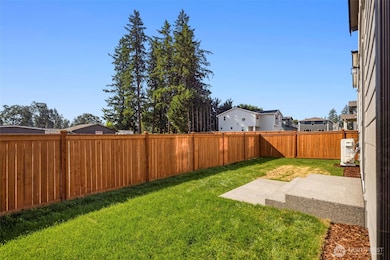 South facing backyard lawn area gets the sunshine on those nicer days! No other homes are directly behind this house, good privacy.
