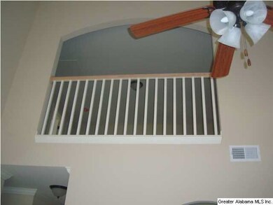 Looking from foyer up to the loft area.