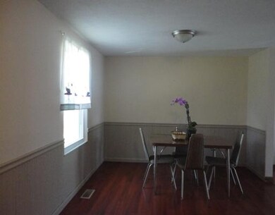 Dining Room. There is ample space for family gathe