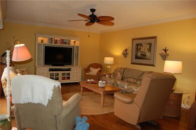 Wood floors, crown moldings, ceiling fans are grea