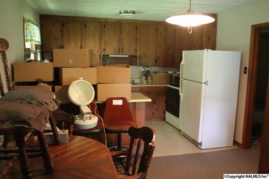 Kitchen adjoins the dining area.
