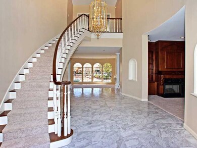 Lobby/Reception. Marble Entry Foyer w/Grand Stairc