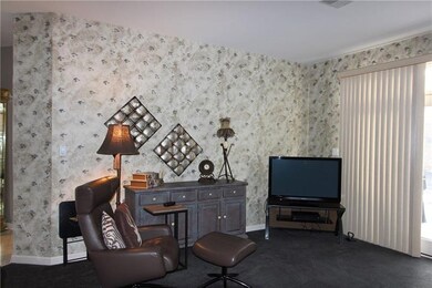 Family room for entertaining with easy access to p