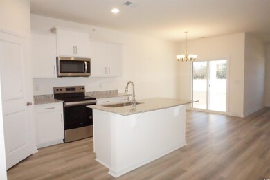 Kitchen featuring stainless steel appliances, deco