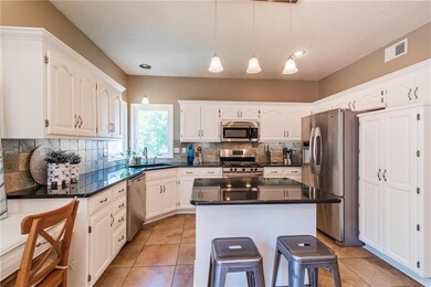Pantry and Island with pull out drawers.  Under co