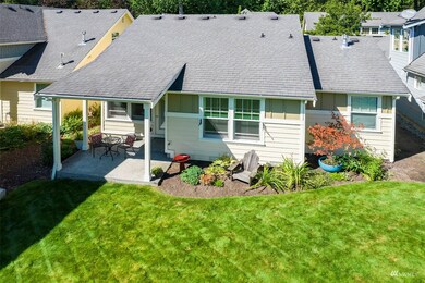 Back patio is covered for year round dining and enjoyment.