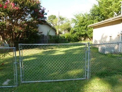 Large gate entering into backyard