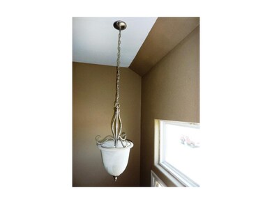 Brush Nickel lighting and hardware throughout.