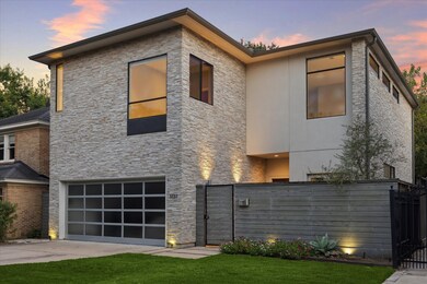 Welcome to 1737 Banks Street, a modern 4-bedroom h