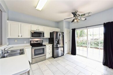 Large kitchen with new stainless appliances, pantr