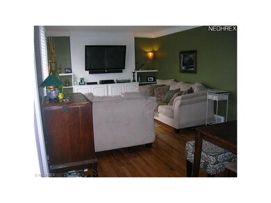 LIVING ROOM W/HARDWOOD FLOORS & MEDIA WALL!