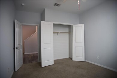 Unfurnished bedroom with carpet floors, a closet,