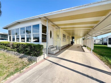 Front of home with long driveway