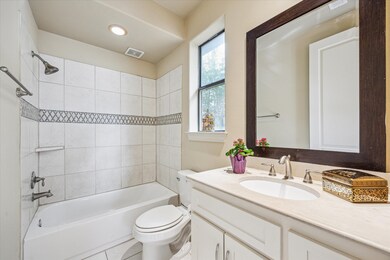 ENSUITE BATHROOM… Bathroom features a clean, moder