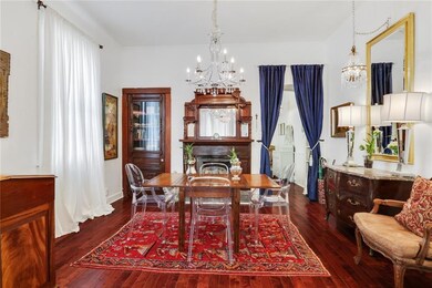 Spacious Dining Room with Gorgeous Fireplace Mante