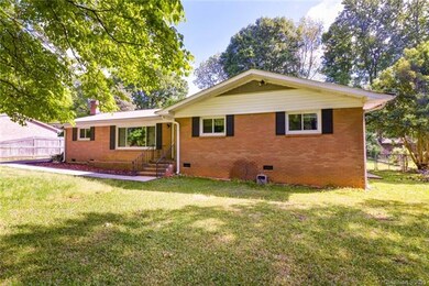 All-brick ranch with oversized detached garage