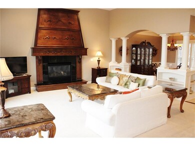 Great room with detailed fireplace and wonderful g