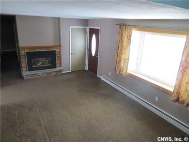 Living Room. Spacious living room with fireplace, 