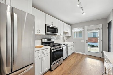 1400 Paddock Dr, Florissant, MO 63033 - photo 7