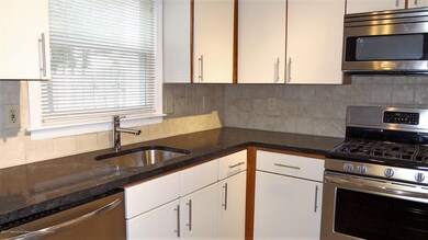 Kitchen Showing Sink & Window & Stove -