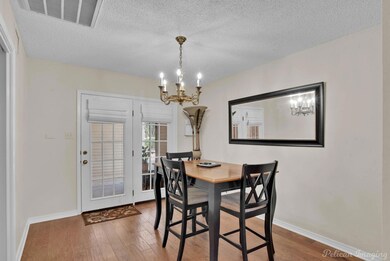 Dining space featuring hardwood / wood-style floor