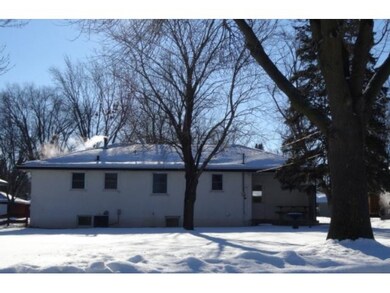 Back of home.  Small porch is behind the garage.  