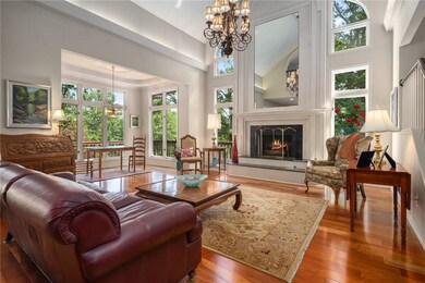 Abundant natural light illuminates open living are