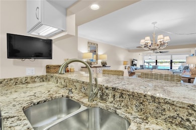 Gorgeous granite counters, under cabinet lighting, and added TV!