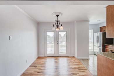 Unfurnished dining area featuring light hardwood /