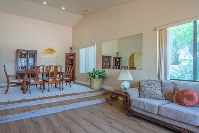 Living & Dining Rooms w/Vaulted Ceilings