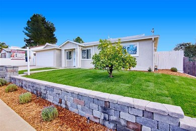 Front yard has auto-sprinklers installed.