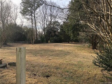 HUGE Flat & Private Backyard is Mostly Fenced.