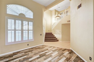 Entry & living room with upgraded flooring!